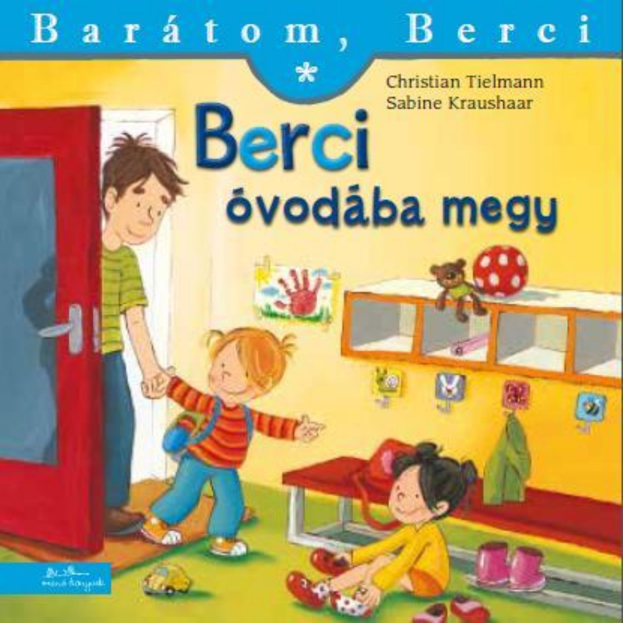 „Berci óvodába megy” könyv borítója – Berci vidáman lép be az óvodába apukája kezét fogva, hátán kis hátizsákkal. A bejáratnál egy kislány ül és cipőt vált, mögöttük színes kabátakasztók, játékok és rajzok láthatók a falon. Barátságos, biztonságot sugárzó óvodai környezet.