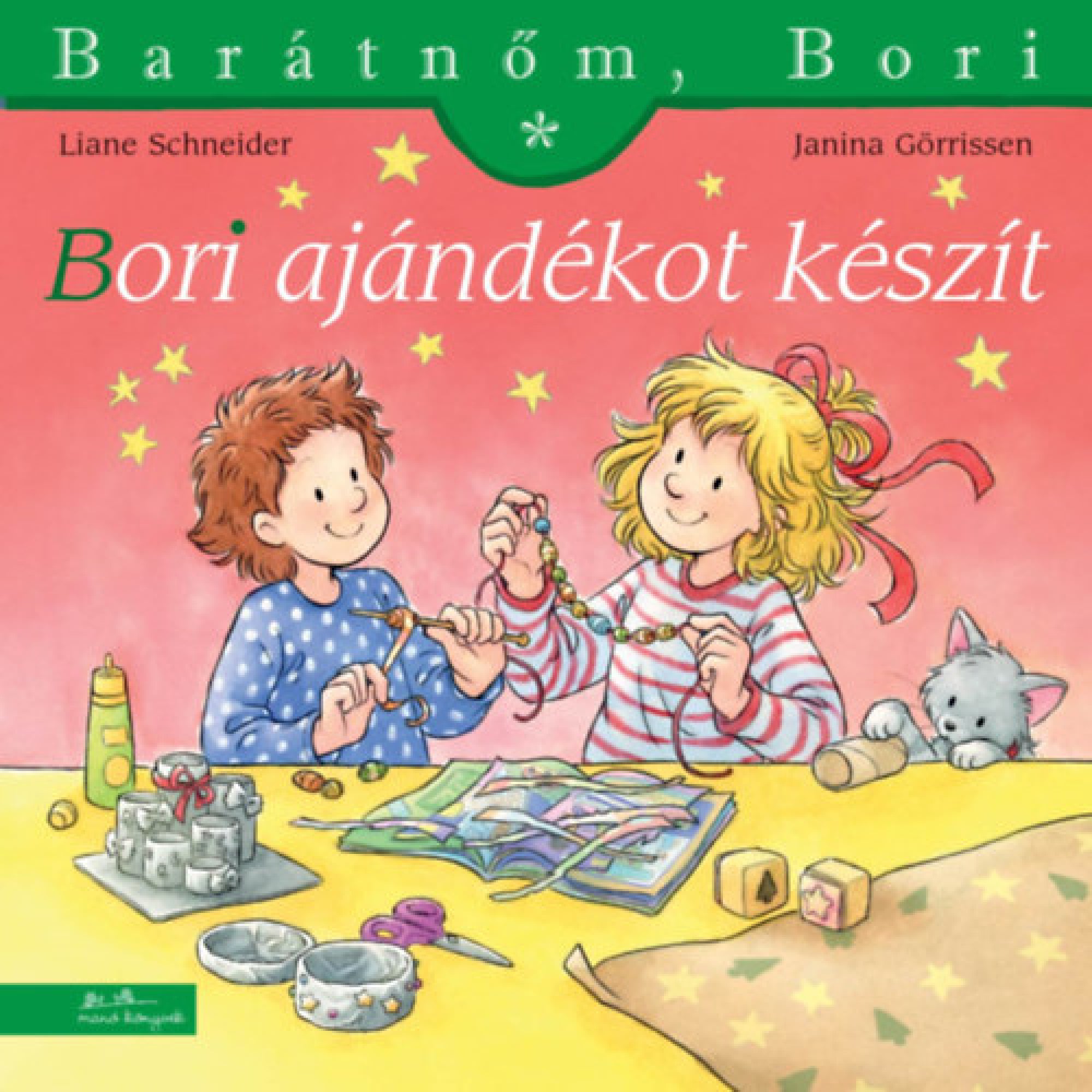 „Bori ajándékot készít” borító – Bori és egy barátja kreatív ajándékkészítés közben, színes papírokkal, gyöngyökkel, ollóval és szalagokkal díszített asztalnál, ünnepi hangulatban.
