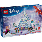 LEGO Disney Frozen adventi naptár 2025 (43273) dobozkép, karácsonyi hangulattal, figurákkal és ajándékokkal a fenyőfa körül.