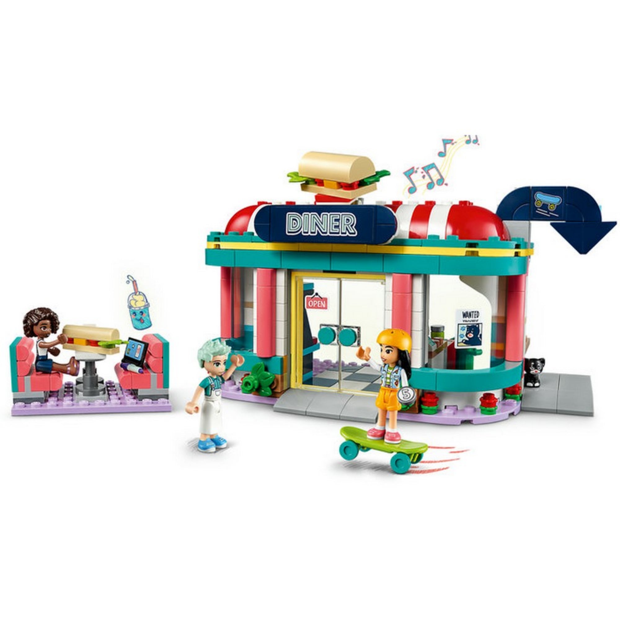LEGO Friends 41728 Heartlake büfé – a szett belső nézete, ahol a kiszolgáló Charli ételeket ad át a pultnál, míg Aliya és Liann a vendégtérben tartózkodnak. Színes részletek, italautomata, tálalópult és falra ragasztott zenei matricák fokozzák az autentikus hangulatot.