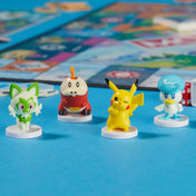 Monopoly Pokémon társasjáték négy játékfigurája: Pikachu, Fuecoco, Sprigatito és Quaxly.