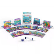 BrainBox A tenger mélyén társasjáték: kártyák, homokóra és dobókocka a dobozzal együtt bemutatva.