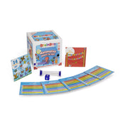 A BrainBox – Matematica pentru cei mici játék tartalma: kocka, homokóra és több színes feladványkártya, a doboz mellett elrendezve.