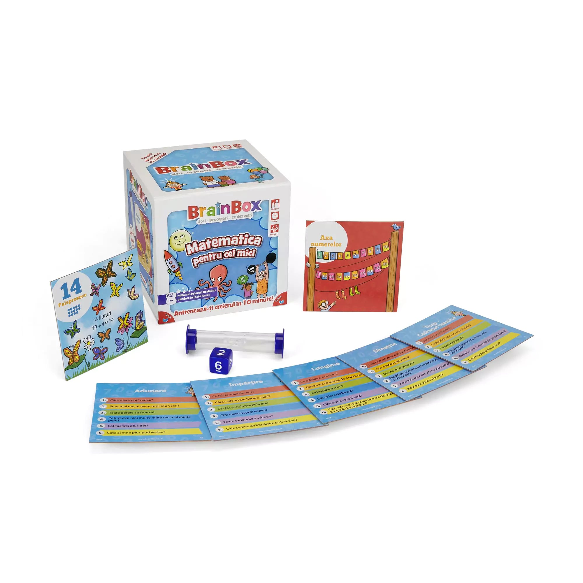 A BrainBox – Matematica pentru cei mici játék tartalma: kocka, homokóra és több színes feladványkártya, a doboz mellett elrendezve.