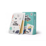 Feles vagy Mersz?! társasjáték doboza és kártyái, színes illusztrációkkal.