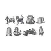 Monopoly Classic fém bábuk közelről: kutya, macska, autó, kalap, pingvin, kacsa, gyűszű és pénzeszsák.