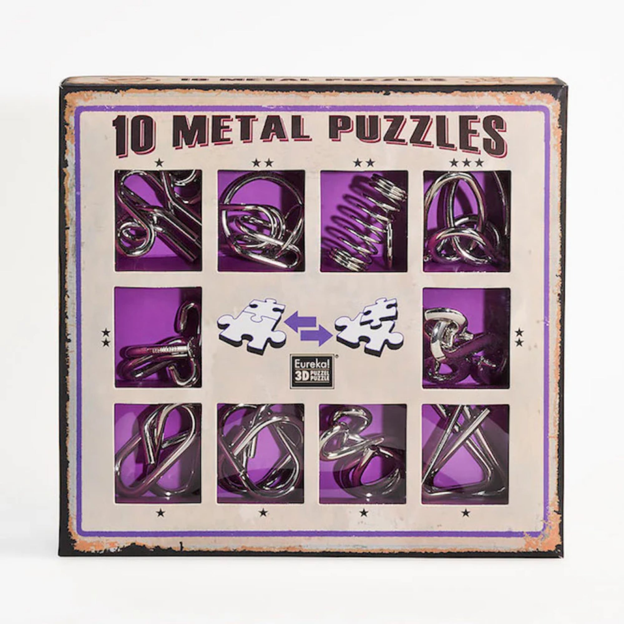 Négyzet alakú kartondoboz, amely tíz különböző fémből készült logikai kirakót tartalmaz, lila háttérrel és „10 Metal Puzzles” felirattal, középen két puzzle darab grafikájával.