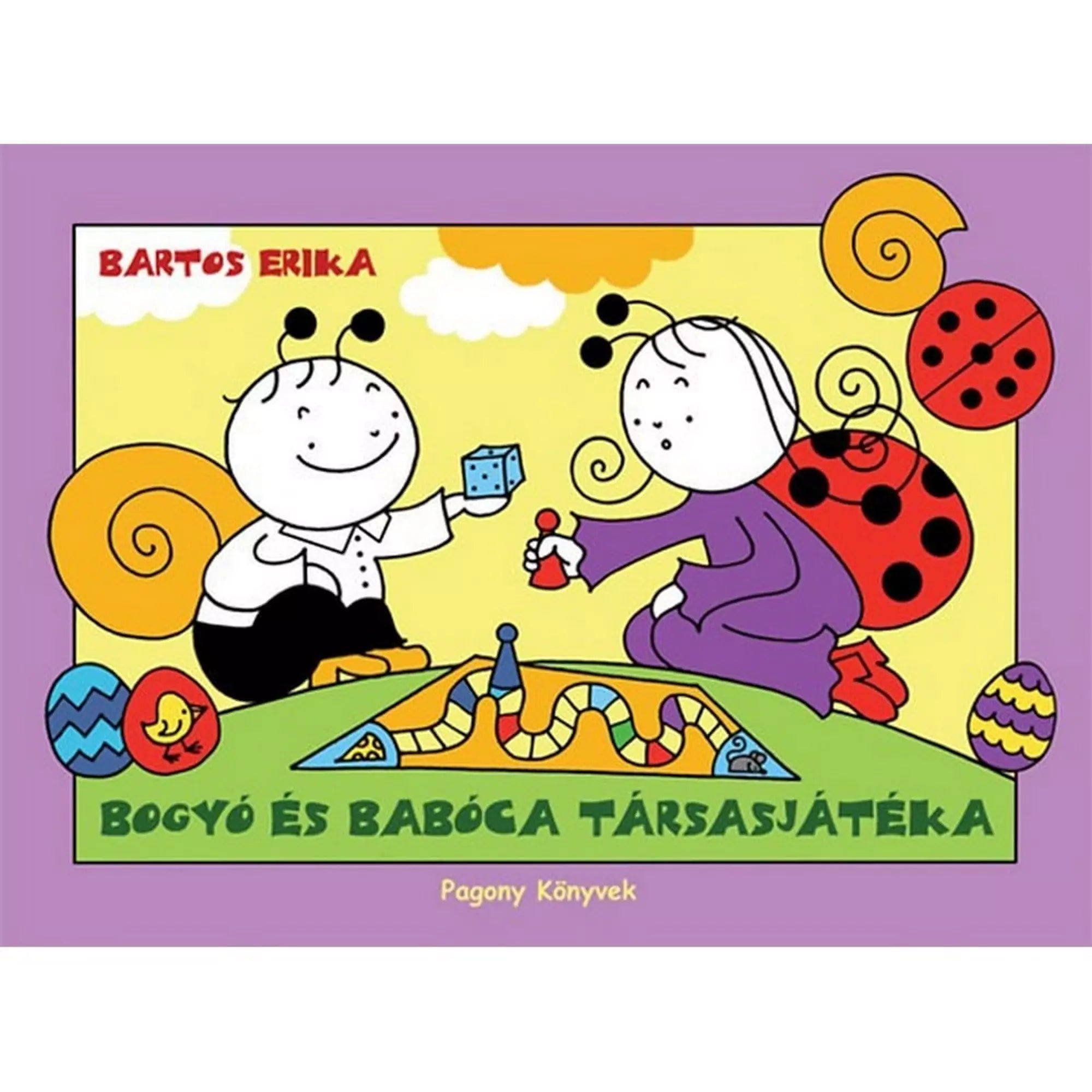  A „Bogyó és Babóca társasjátéka” című könyv borítója, amelyen Bogyó dobókockát tart, Babóca pedig bábut mozgat egy színes társasjátékon, húsvéti tojásokkal és lila keretben.