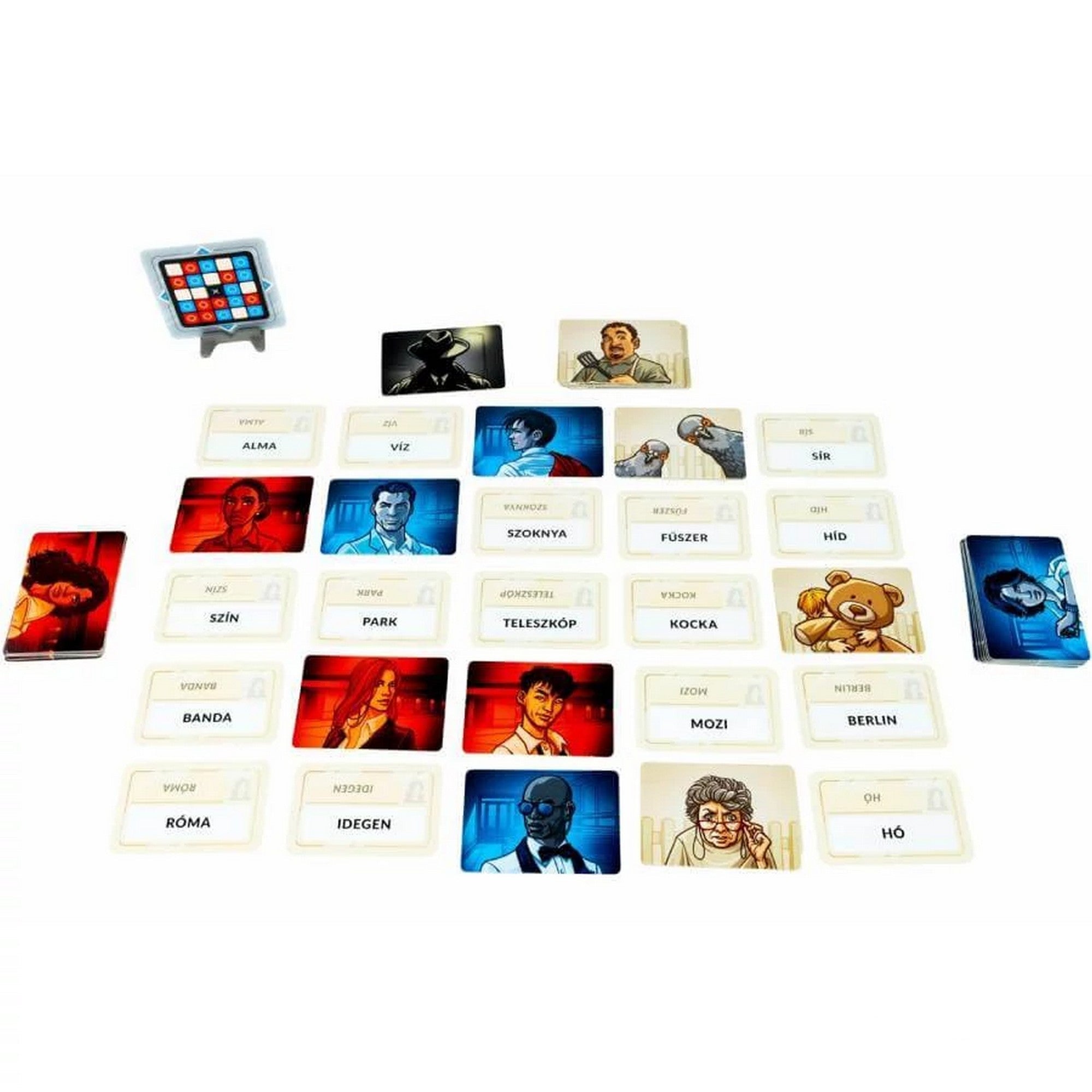 Fedőnevek társasjáték játéktér játék közben, szó- és ügynökkártyák elrendezve