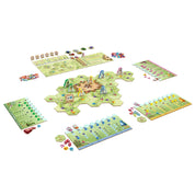 A Gnome Hollow társasjáték teljes játéktérképe játék közben, hexagon lapkákkal, törpe figurákkal és játékostáblákkal.