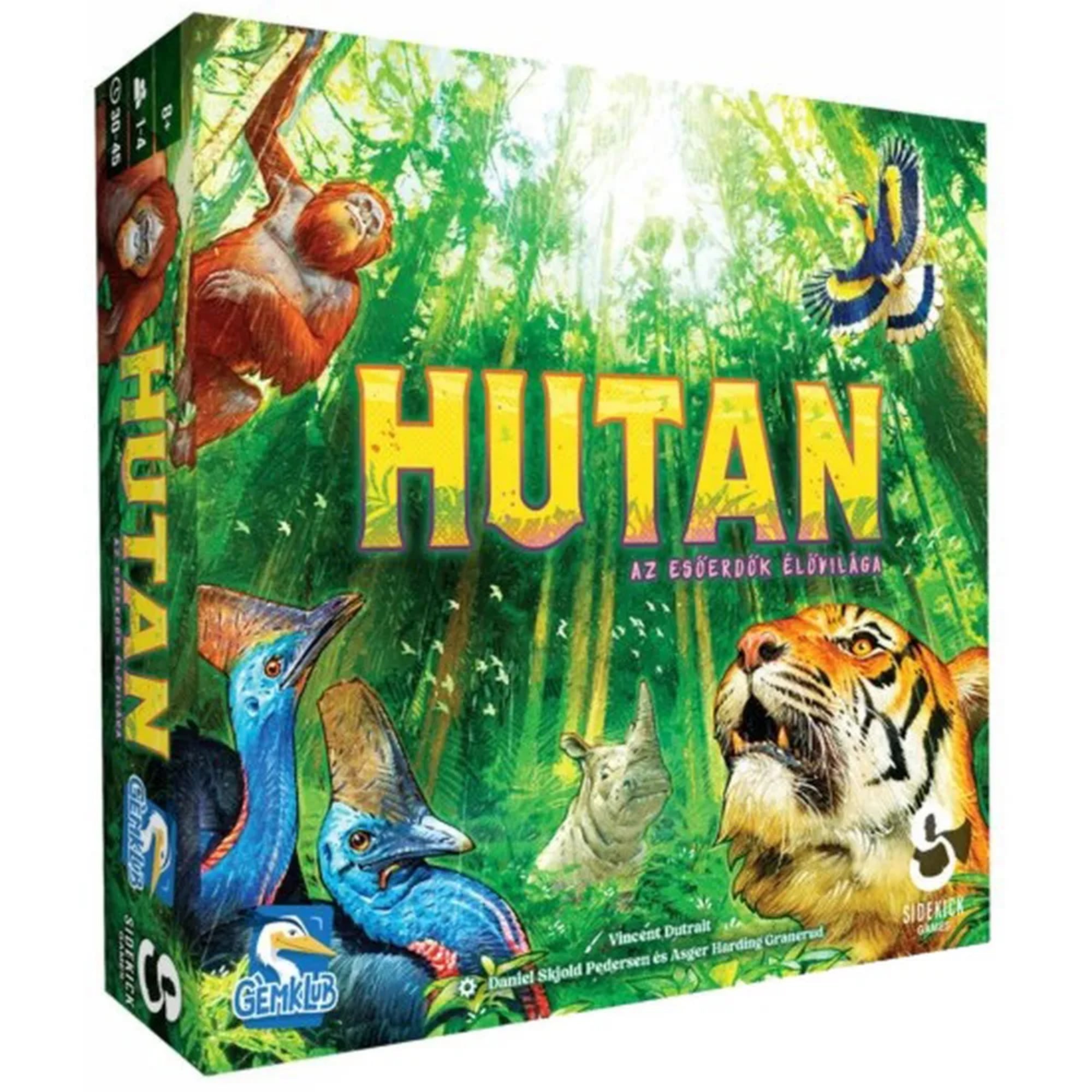 A Hutan – Az esőerdők élővilága társasjáték doboza színes, részletgazdag grafikával, amelyen különféle esőerdei állatok – tigris, orángután, kazuár – láthatók.