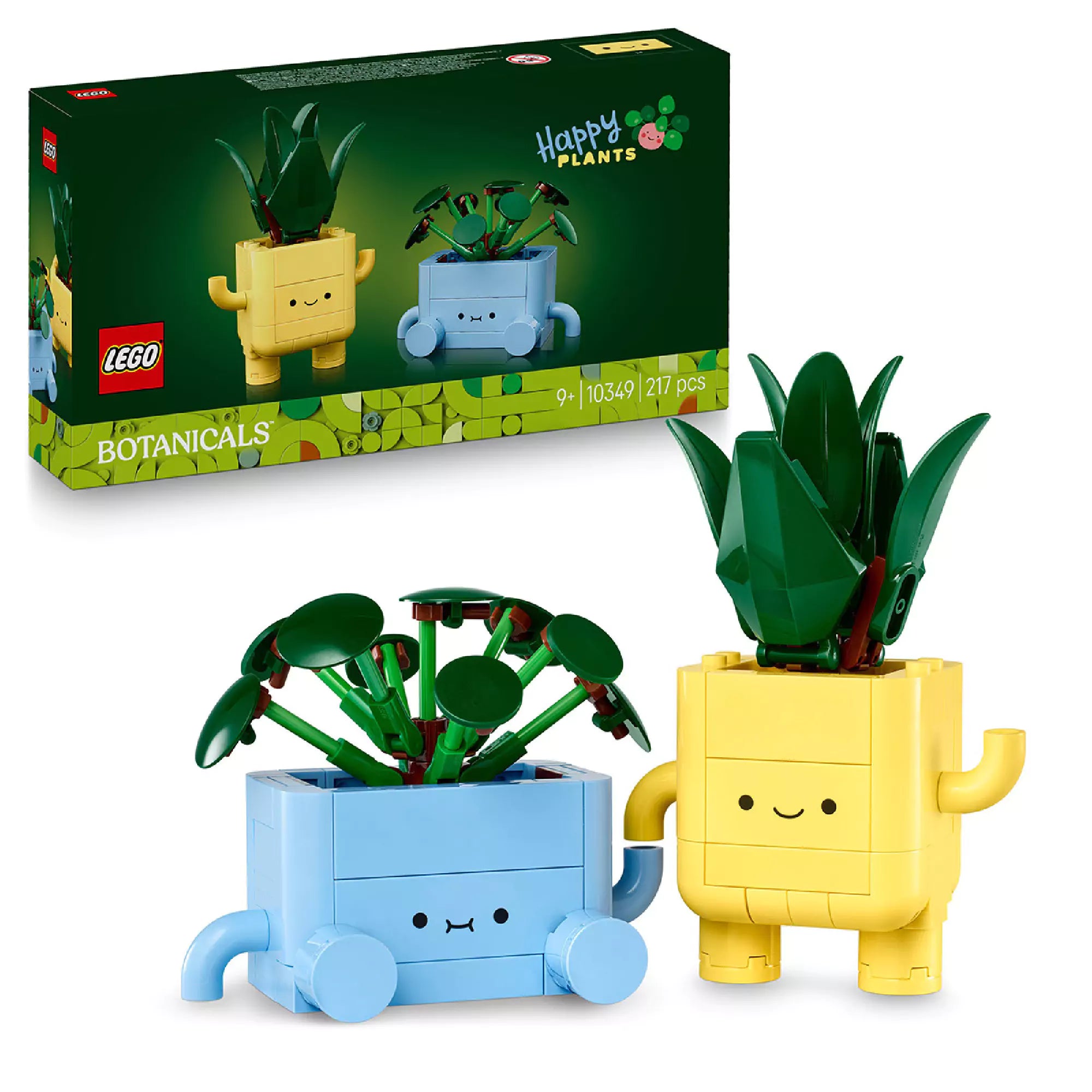 A LEGO Happy Plants (10349) megépített figurái dobozzal együtt: a sárga cserép vastag levelű növénnyel, a kék cserép pedig kis zöld levelekkel.
