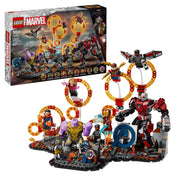 LEGO Marvel 76323 Avengers: Endgame – Végső csata szett felépítve, háttérben a dobozzal, Thanos, Vasember, Pókember, Skarlát Boszorkány és más hősök minifiguráival, narancssárga portálokkal és egy óriás robotpáncéllal.