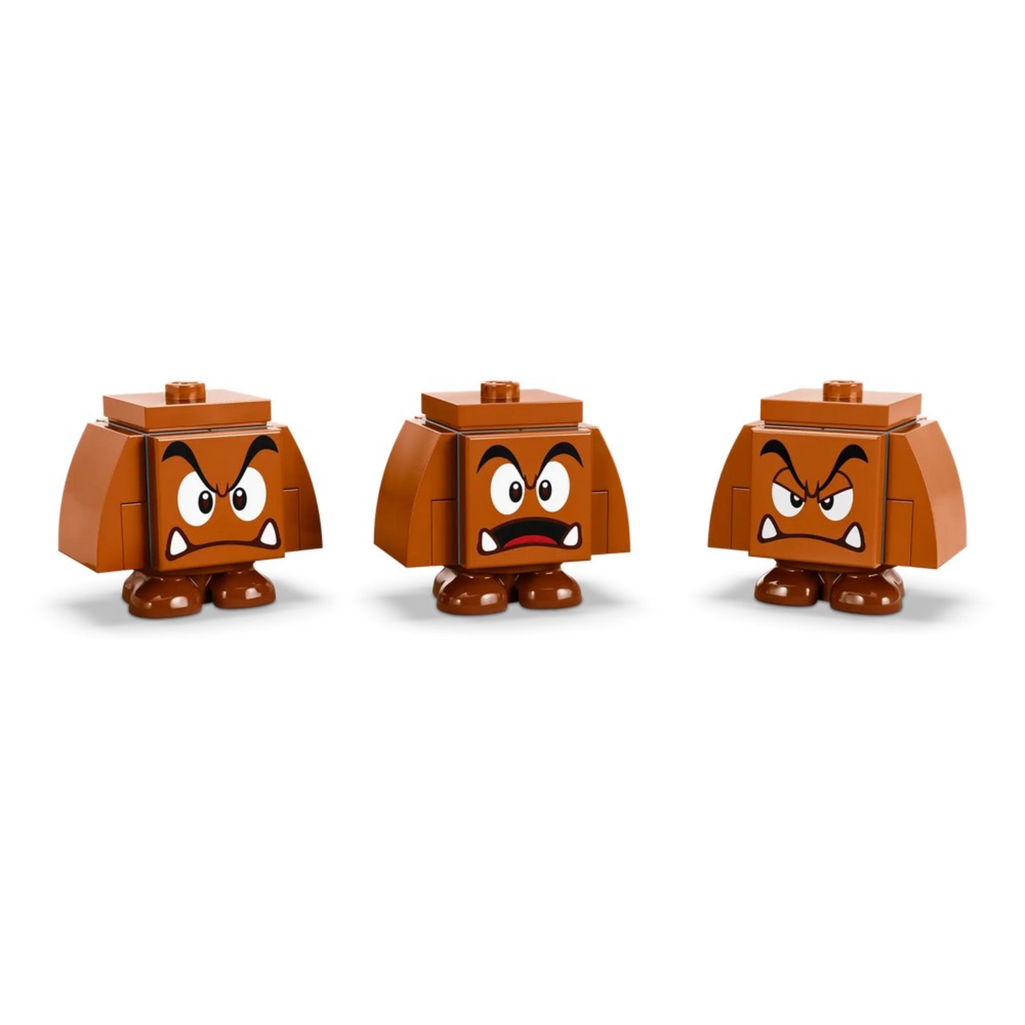 Három különböző arckifejezésű Goomba figura a LEGO Super Mario Goomba játszótér (71433) készletből, fehér háttéren.
