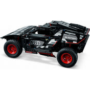 LEGO Technic Audi RS Q e-tron 42160 terepjáró oldalnézetből, részletes grafikával, Audi gyűrűs logóval, „Future is an attitude” felirattal és piros felnikkel.