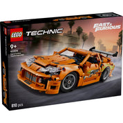  LEGO Technic Fast and Furious Toyota Supra MK4 (42204) doboza szemből, látványos városi háttérrel és száguldó autóval.