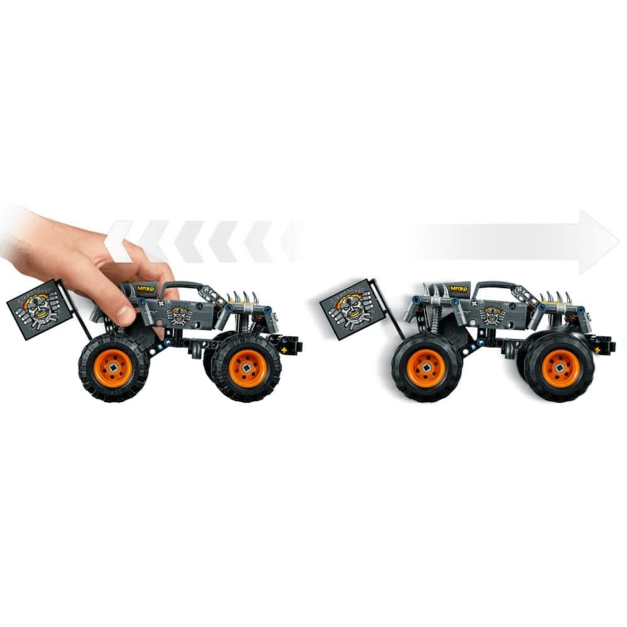 A LEGO Technic Max-D szörnyeteg teherautó működés közben, a képen a visszahúzható motor funkcióját szemléltetik, ahogy a jármű előrelendül.