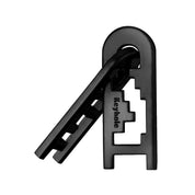 A Huzzle Cast Keyhole logikai fém kirakó, fekete színben, összekapcsolt állapotban, oldalnézetből fotózva.