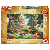 A Puzzle Schmidt: Thomas Kinkade; Disney Winnie the Pooh 1000 darabos kirakó doboza, amelyen a Disney klasszikus karakterei – Micimackó, Malacka, Tigris, Füles és Róbert Gida – vidám jelenete látható egy festői tájban.