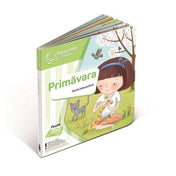 Răspundel Istetel – Primăvara interaktív könyv borító: A tavaszi témájú interaktív könyv borítóján egy kislány pitypangokból fűz koszorút, mellette cica és kismadarak.