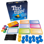 Tuti tipp! társasjáték teljes tartalma: doboz, kérdéskártyák, zsetonok, filcek és jegyzetlapok elrendezve