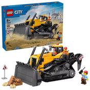 LEGO City: Sárga buldózer 60466 készlet teljes tartalma kibontva, a dobozzal, buldózerrel és három minifigurával együtt.