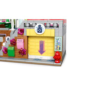 LEGO Friends Heartlake City lakások és üzletek 42670 mosodája tolóajtóval és forgó mosógépekkel.