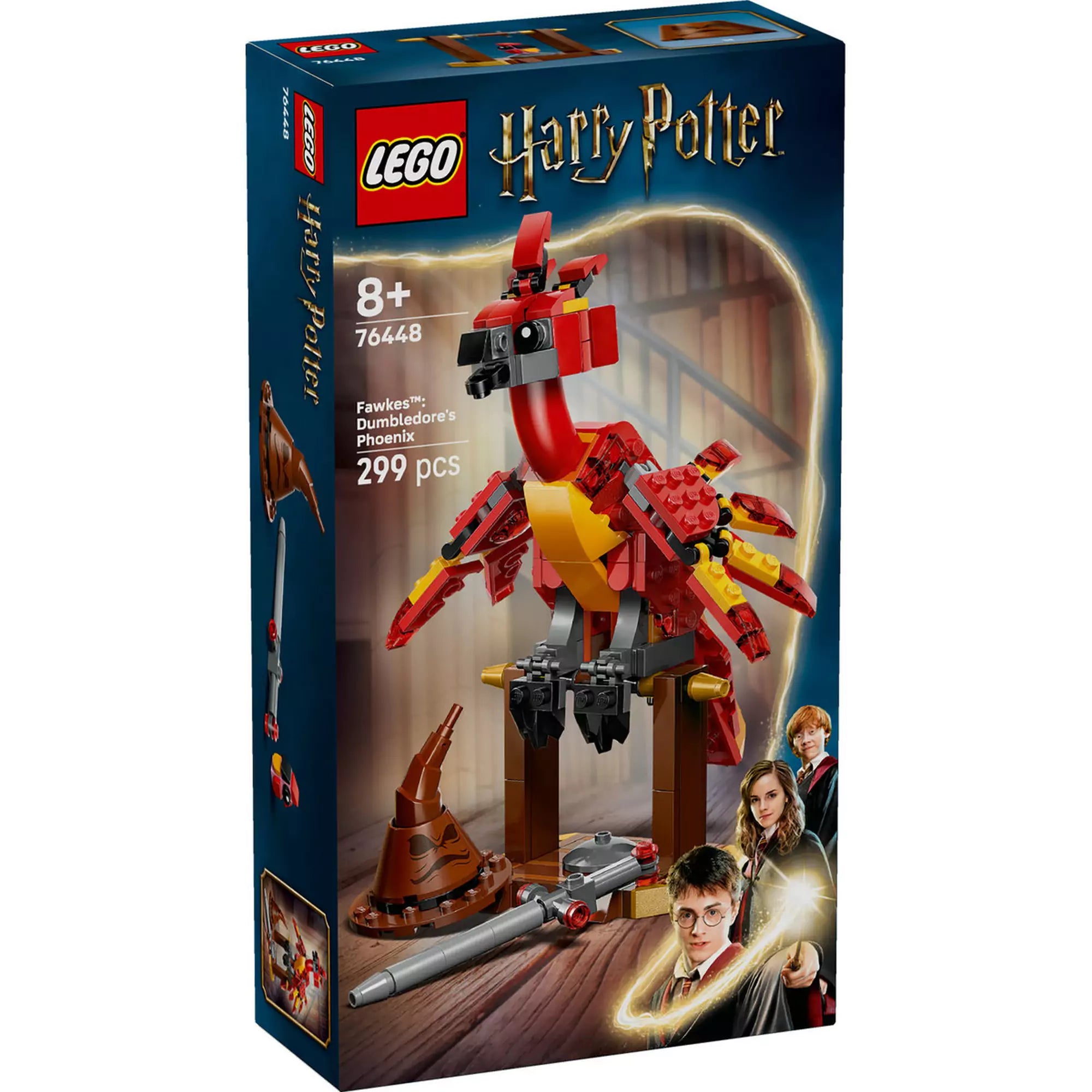 A LEGO Harry Potter 76448 készlet doboza, rajta a Fawkes, Dumbledore főnixe figura épített változatával, 299 darabbal, a háttérben varázslatos könyvtári jelenettel és Harry, Hermione, Ron képeivel.