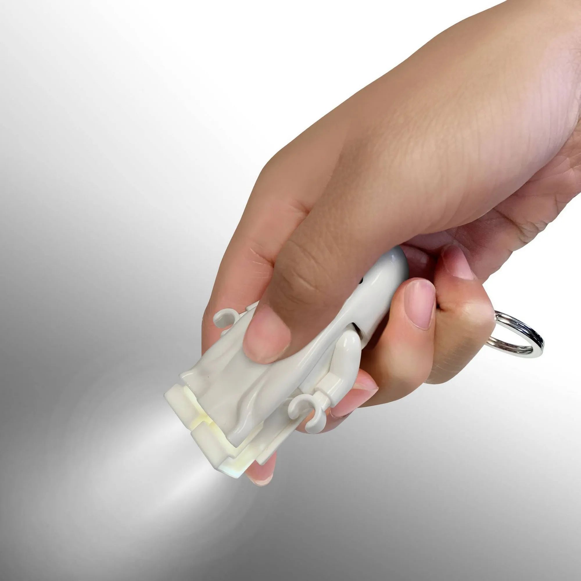 LEGO Iconic: Szellem, világító kulcstartó, LGL-KE48 – Kézben tartott fehér szellem LEGO kulcstartó, amelynek talpán lévő gomb megnyomására világít a LED lámpa.