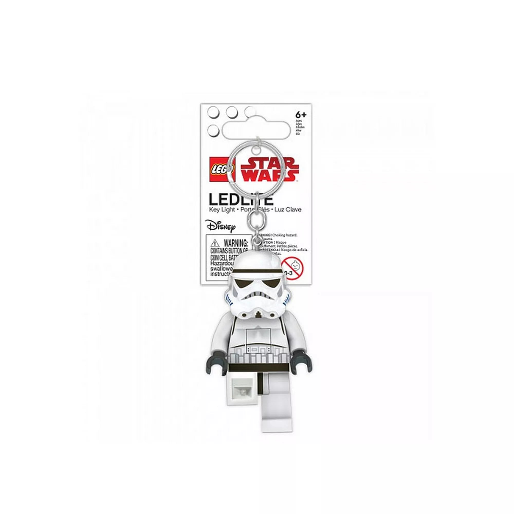 „LEGO Star Wars Stormtrooper LED kulcstartó eredeti csomagolásban, fehér háttér előtt. A 7,5 cm-es rohamosztagos minifigura kulcskarikára rögzítve látható, a lábakba épített LED-lámpákkal és a karton csomagoláson Star Wars és LEGO logókkal.”