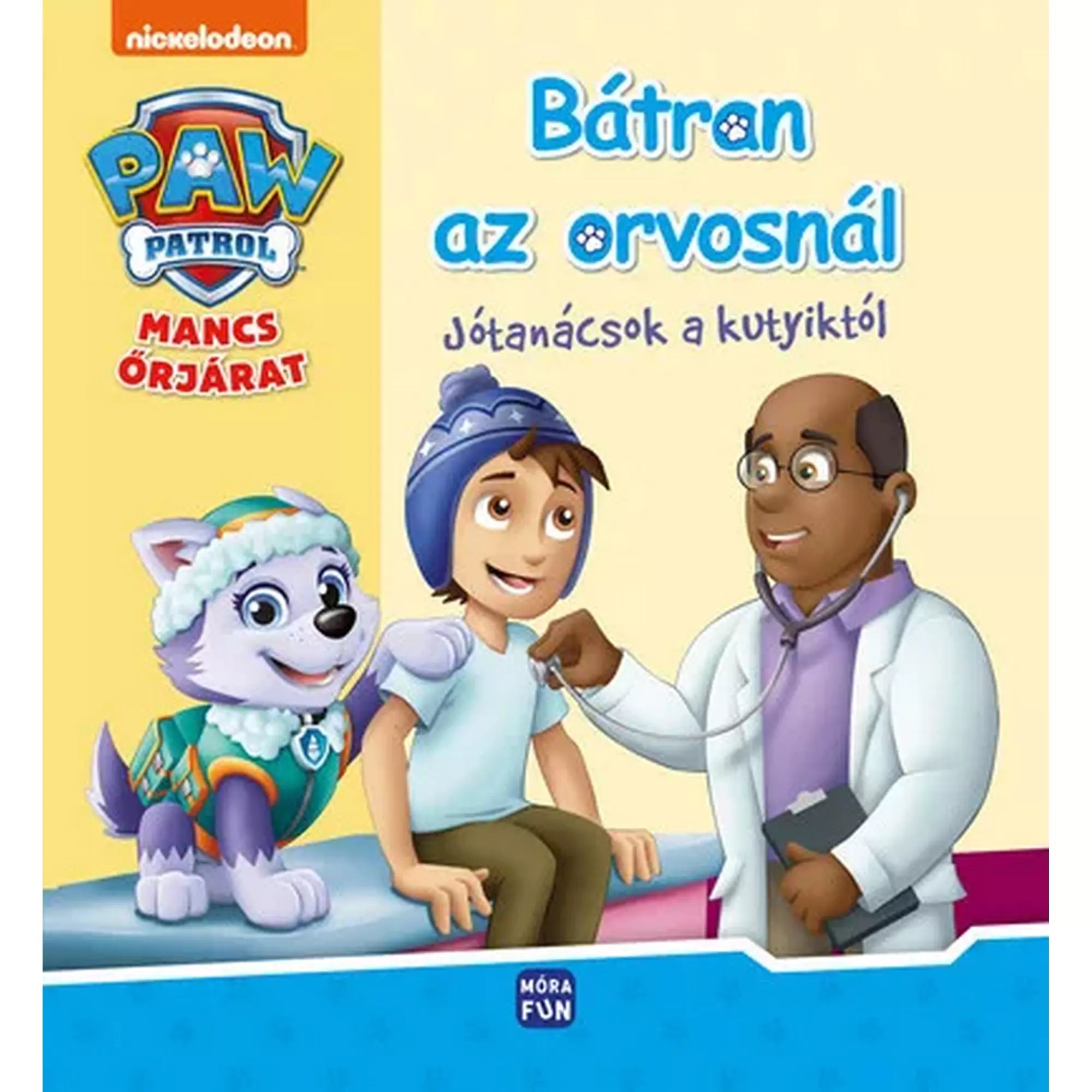 "Mancs Őrjárat: Bátran az orvosnál! mesekönyv borítója, Jake, egy orvos és Everest kutyus vidám jelenetével a rendelőben."