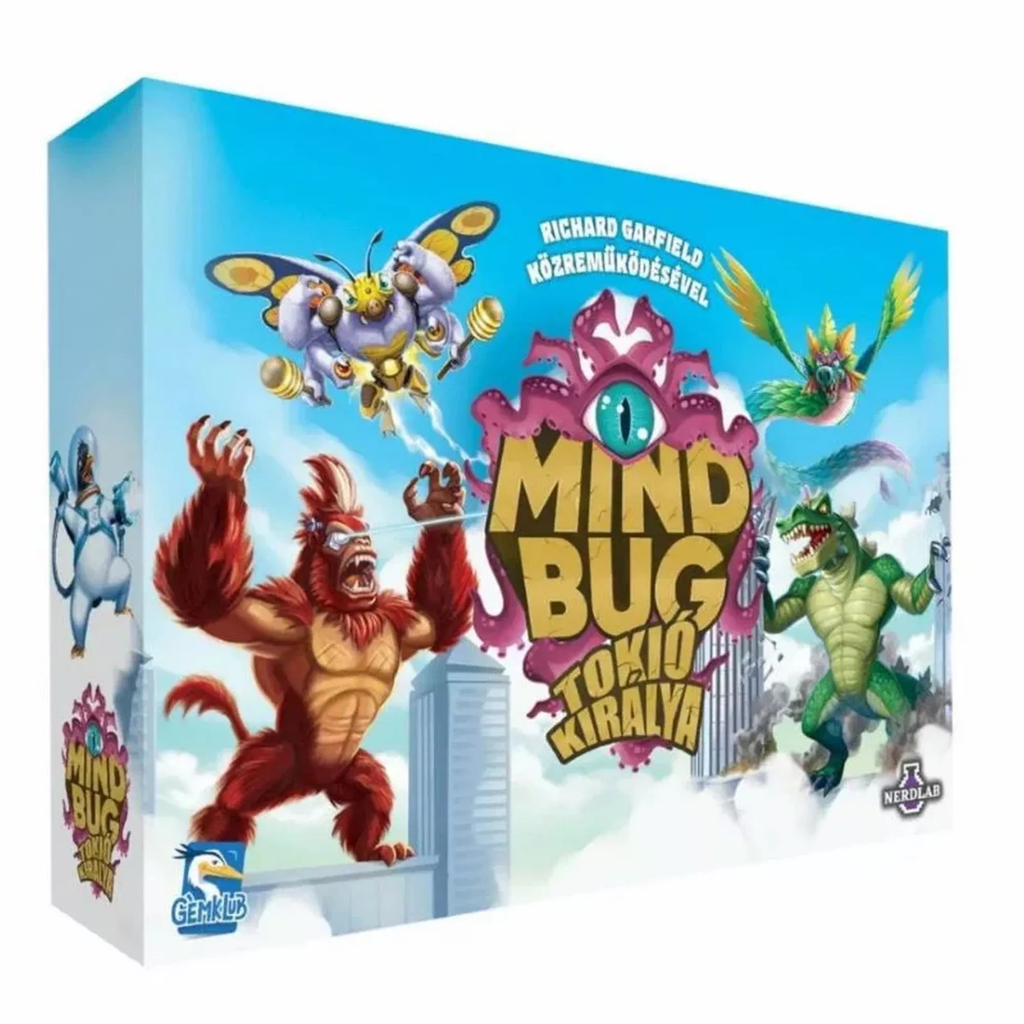 Mindbug x Tokió Királya társasjáték dobozképe, színes illusztrációval, ahol kaidzsú szörnyek csapnak össze Tokió felhőkarcolói felett, Mindbug logóval és Gemklub kiadói jelzéssel.