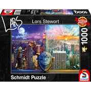  Puzzle Schmidt Lars Stewart, Night and Day: New York – 1000 darabos prémium minőségű kirakó doboza, amely a New York-i városképet ábrázolja nappali és éjszakai fényekben, az Empire State Building központi látványával.