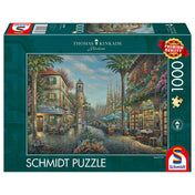 „Puzzle Schmidt: Thomas Kinkade – Spanyol kávézó – 1000 darabos puzzle doboza, amely egy festői mediterrán utcarészletet ábrázol.”