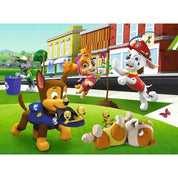 A kirakott puzzle képe, amelyen Chase, Skye, Marshall és Rubble vidáman játszanak egy parkban.